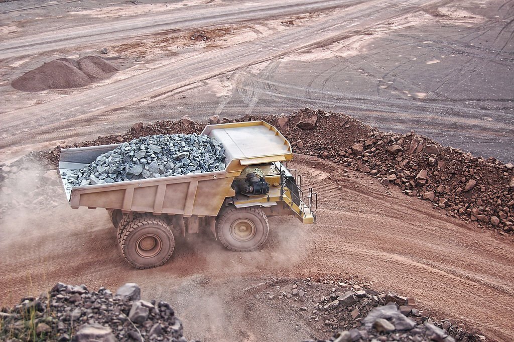 dumper truck on road in a surface mine quarry. mining industry.